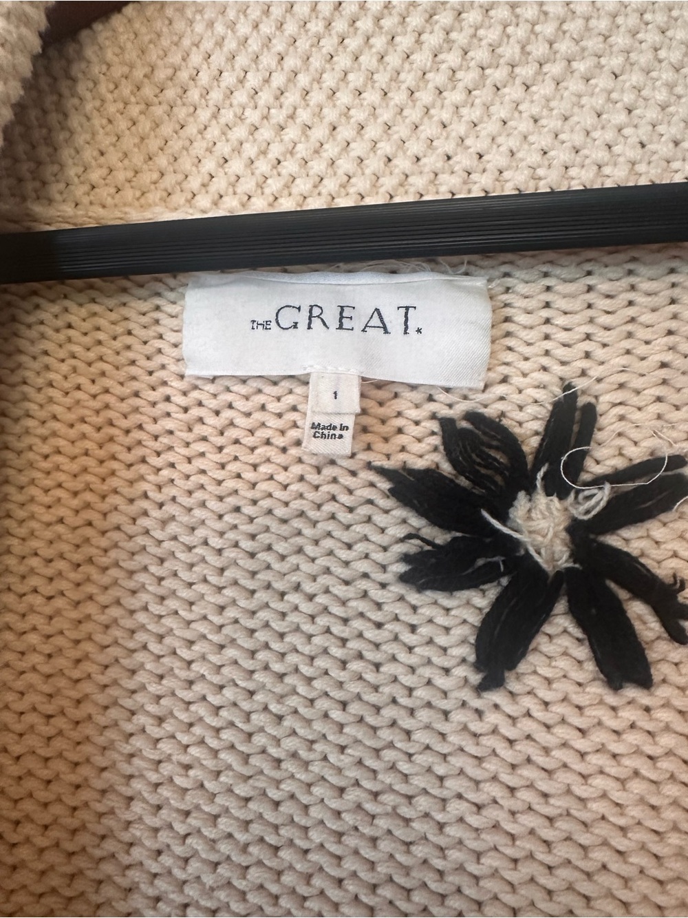 THE GREAT. Cream Open Cardigan with Black Flower Accents - Picture 2 of 5